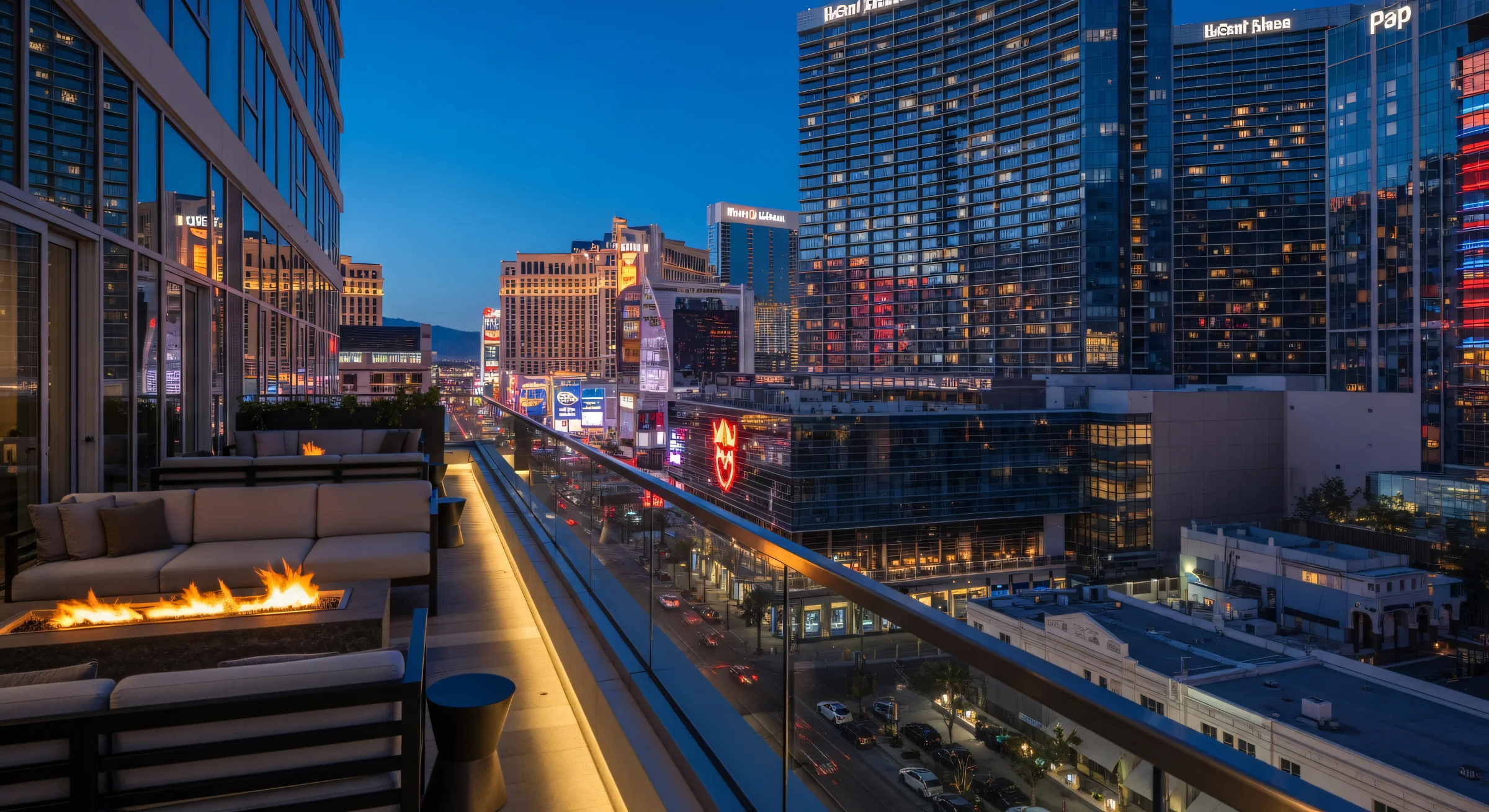 An elevated nighttime view of the Las Vegas Strip from a modern hotel balcony — the market that proved a lower rate can fill more rooms than a higher headline number.