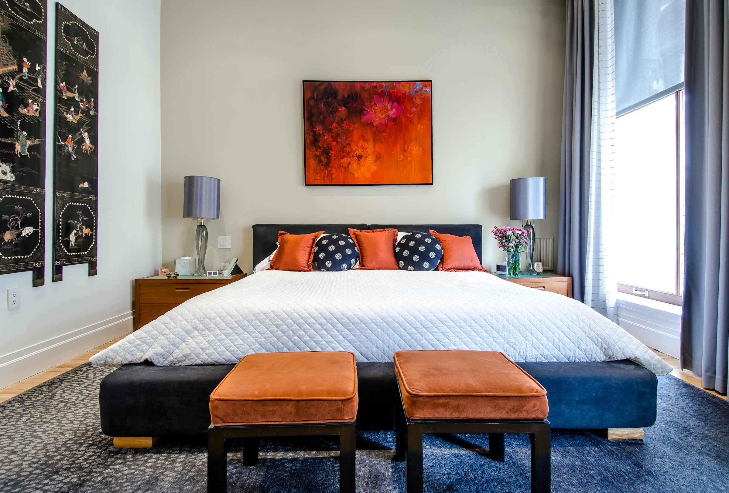 A linen-clad bedroom interior in soft natural light — the design tier inside an STR comp set that pricing data alone cannot see